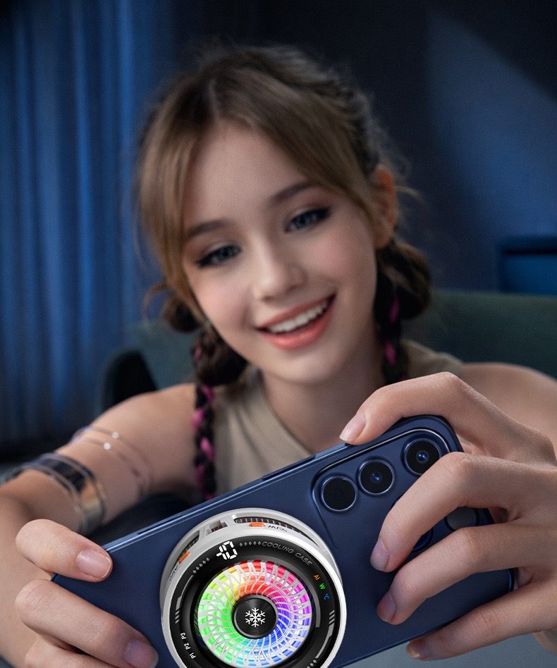 Customer holding a phone with the RGB display cooler attached while gaming